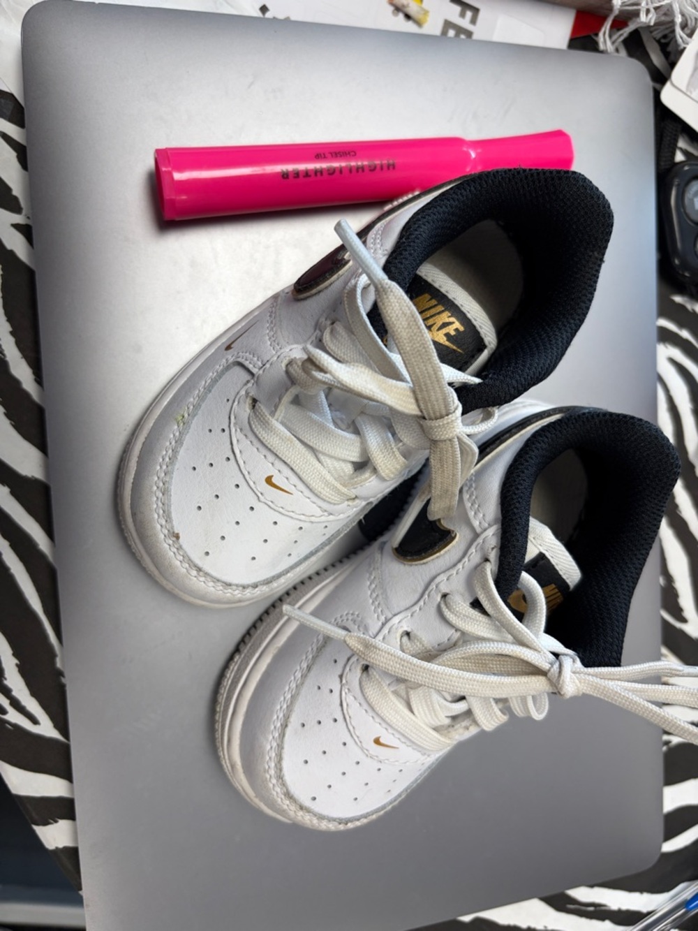 Nike Kids White Sneakers with Black Collar and Gold Swoosh
